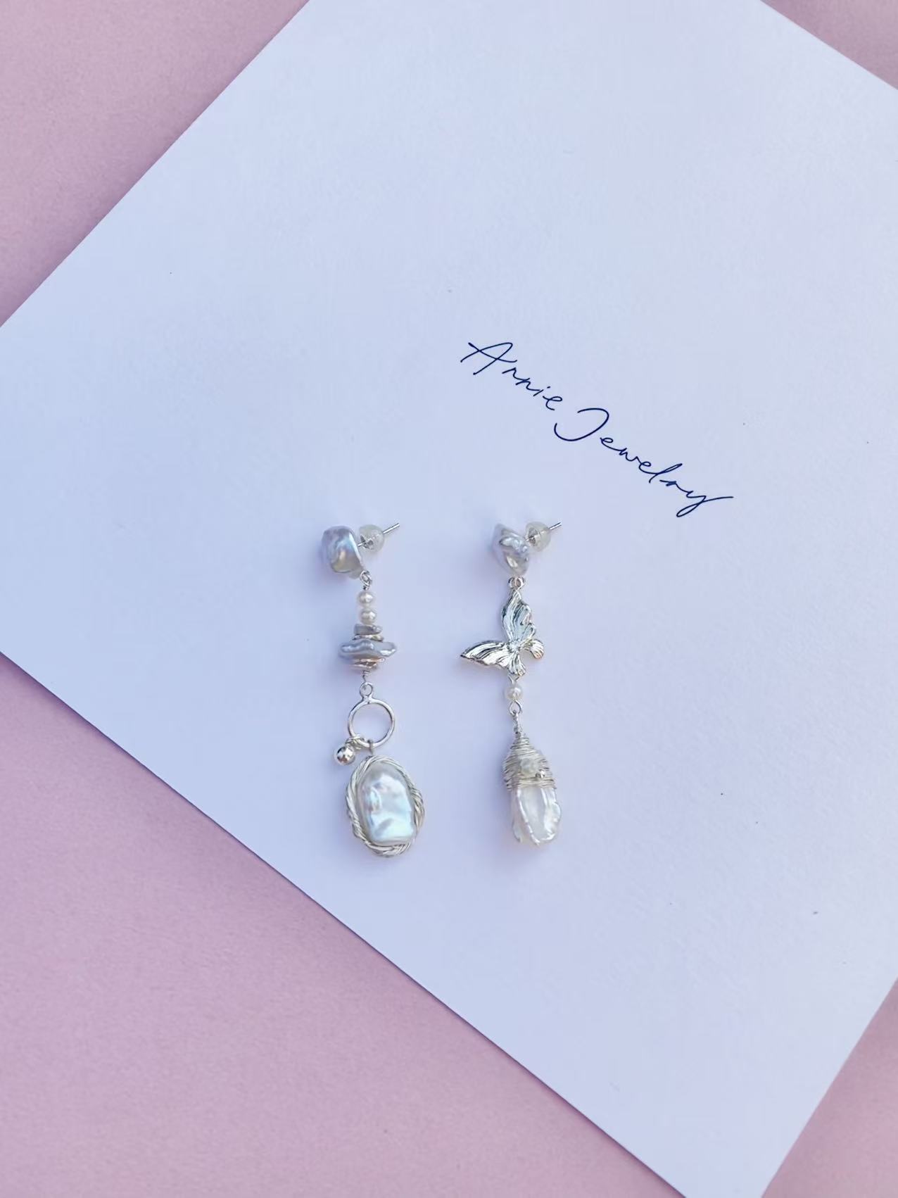 Asymmetric butterfly earrings