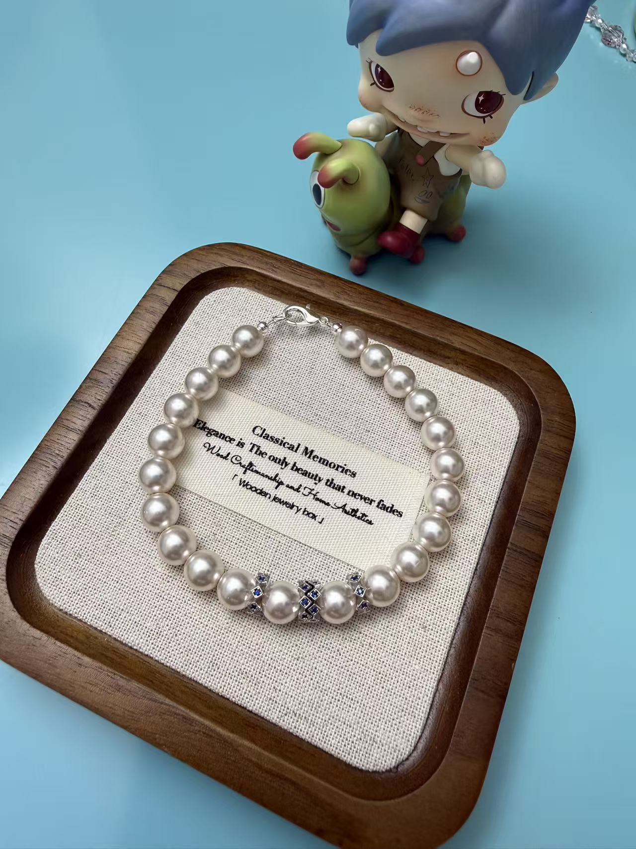 Lustrous White Pearl Bracelet with Blue Crystal Accent - Elegant Bridal & Everyday Jewelry B300