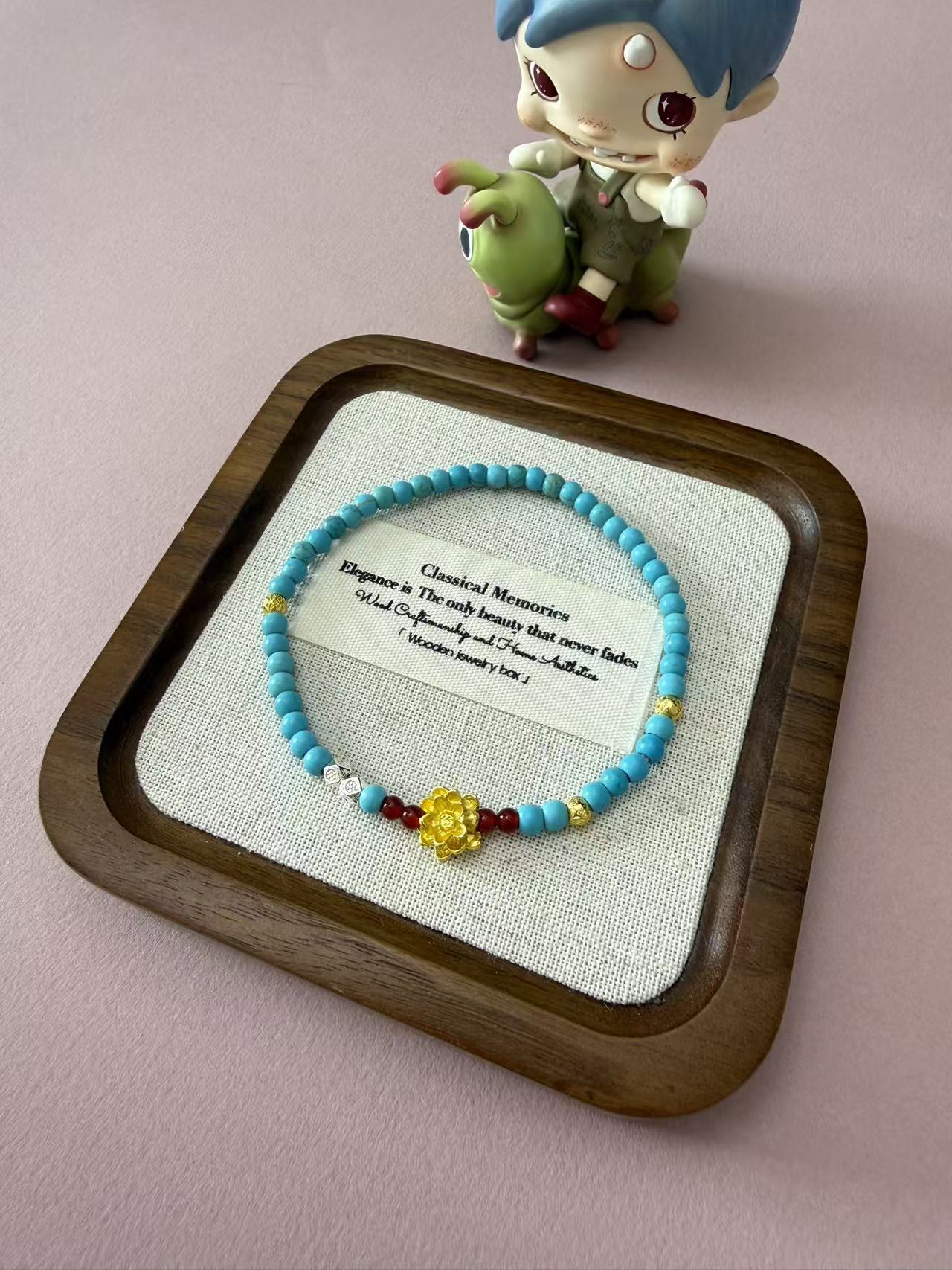 Turquoise Beaded Bracelet with Gold Lotus Charm & Red Agate Accent B359