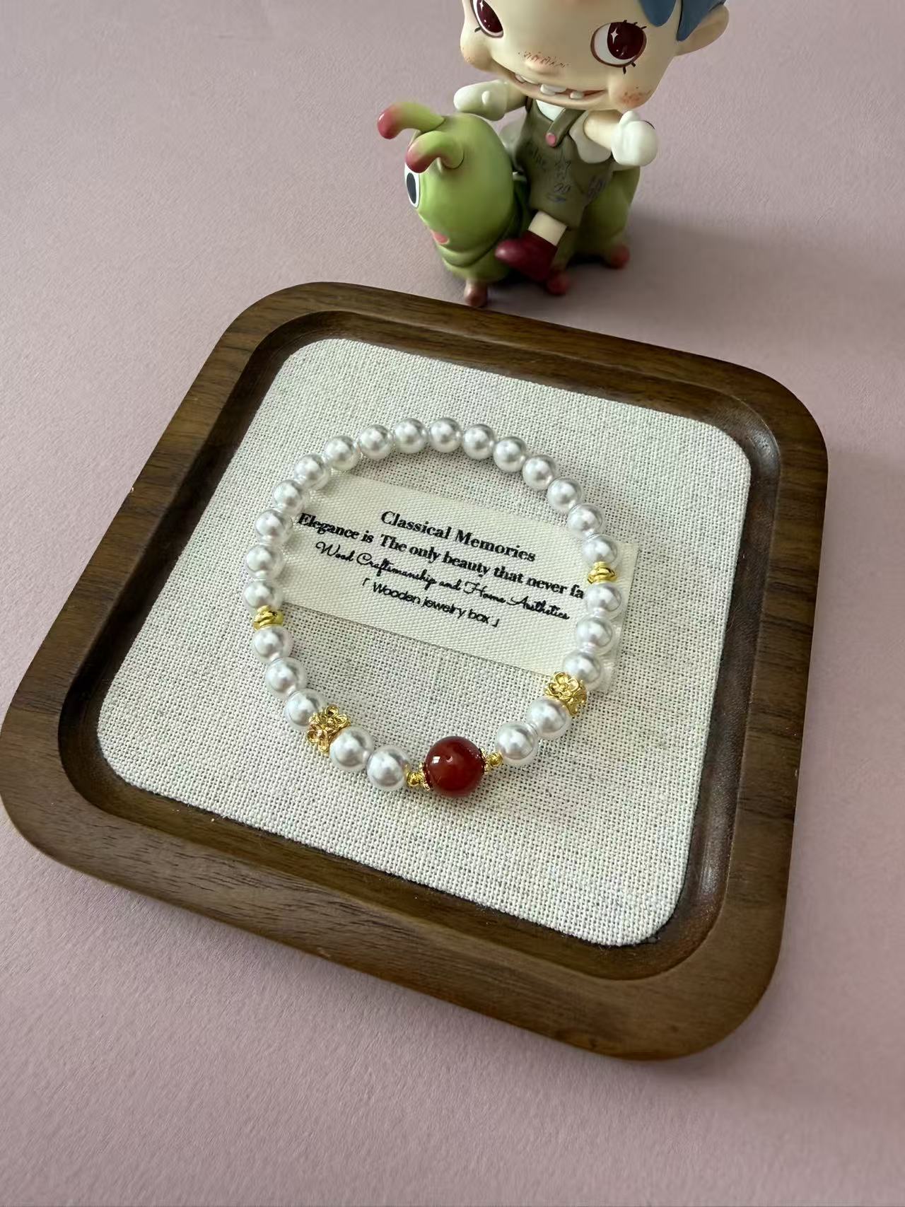Dainty Faux Pearl Bracelet with Red Agate Accent & Gold Floral Charms B361