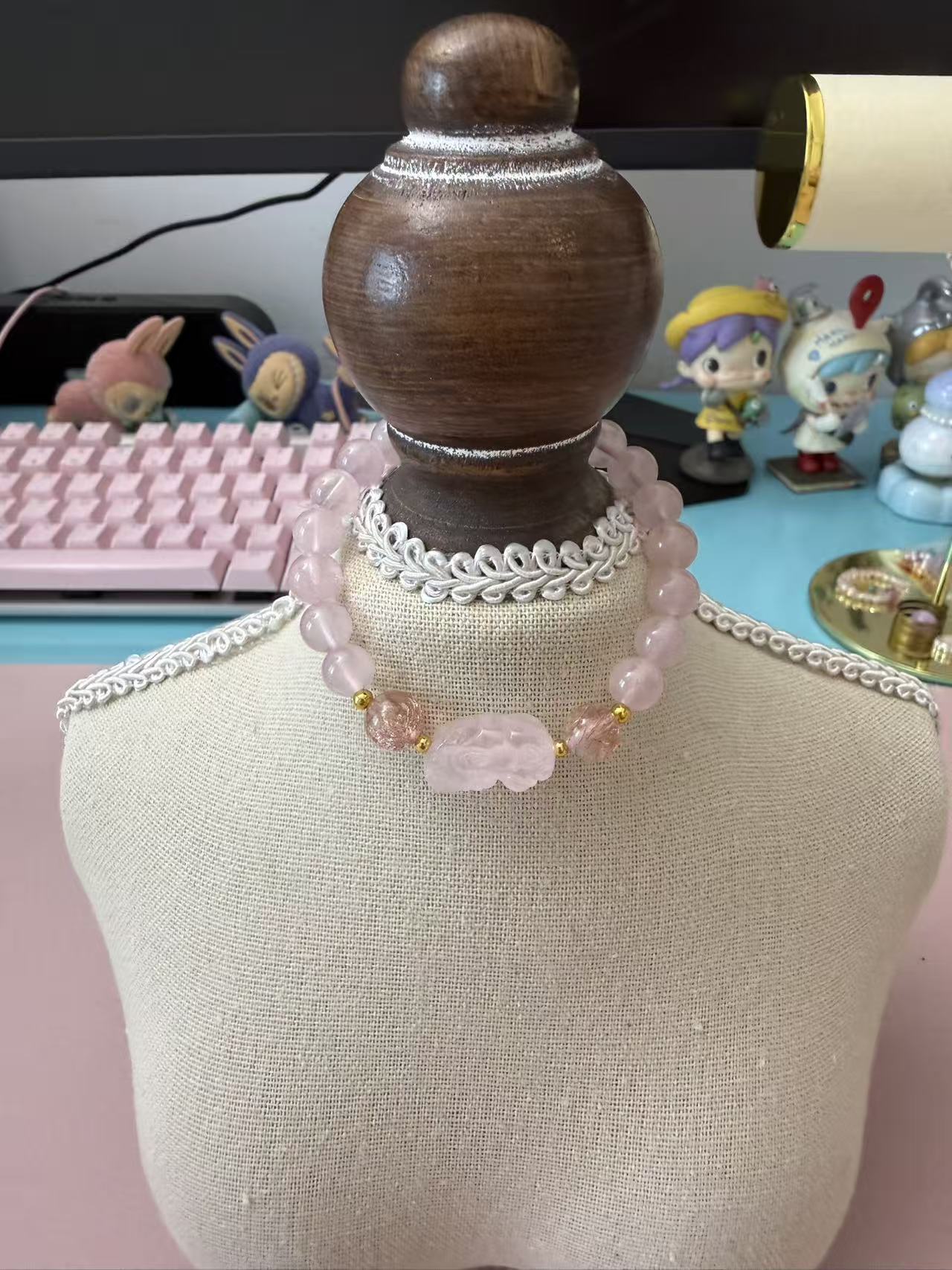 Soft rose quartz beaded bracelet with a carved pixiu charm and strawberry quartz accents, a dainty crystal piece for love, luck, and everyday styling. B365