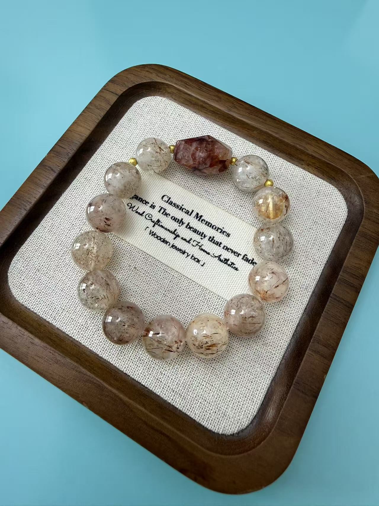 Elegant Copper Rutilated Quartz Bracelet with Faceted Red Crystal Accent B399