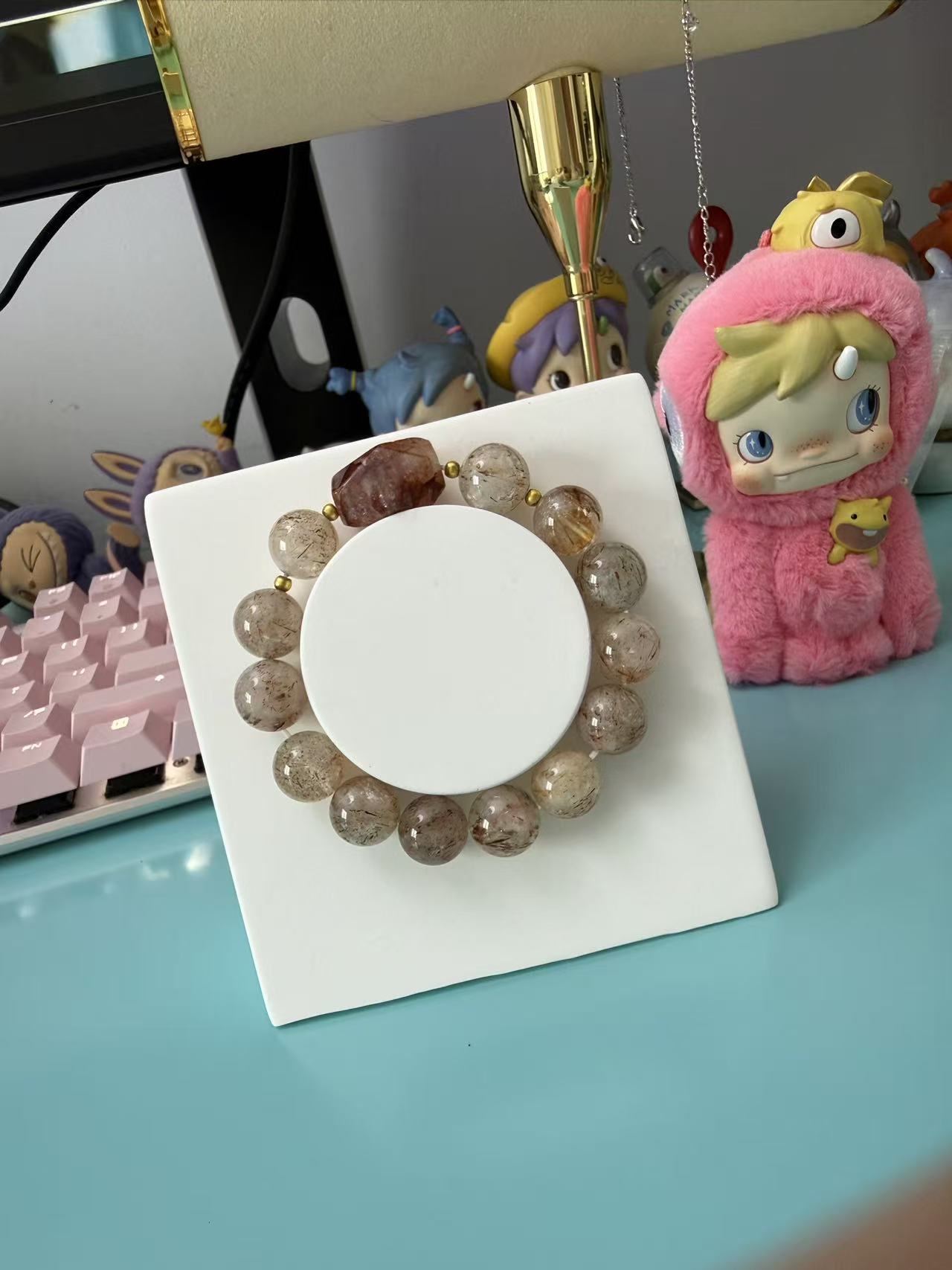 Elegant Copper Rutilated Quartz Bracelet with Faceted Red Crystal Accent B399